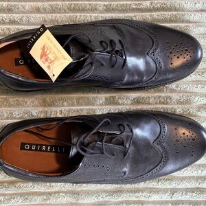NWT Men's solid Black Leather Dress Shoes wing tips classic party events.
